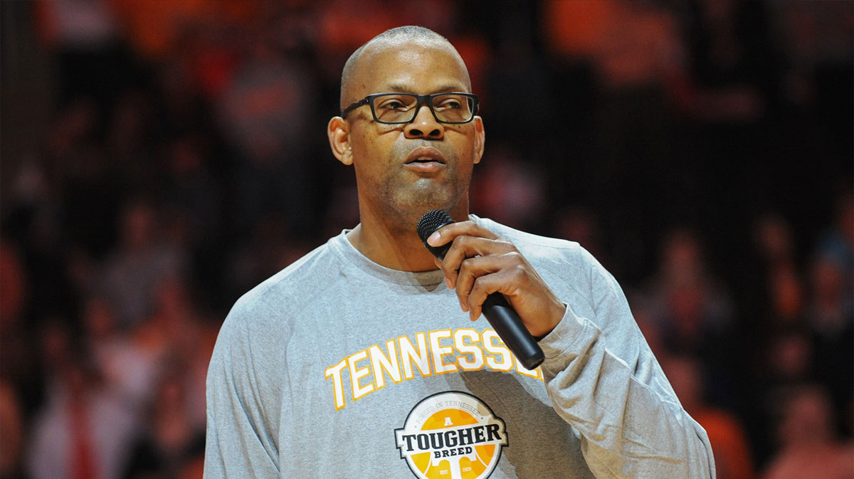 Former Tennessee Volunteers basketball player Dale Ellis speaks during his jersey retirement ceremony before the game against the Vanderbilt Commodores at Thompson-Boling Arena.