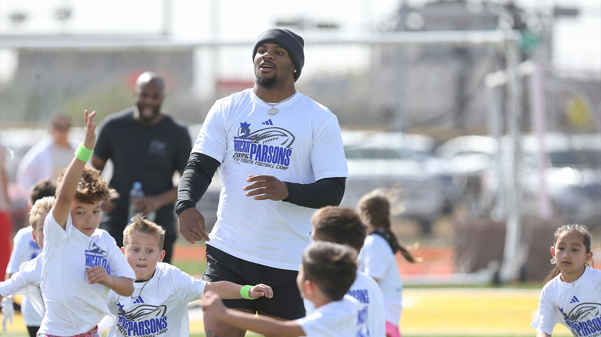 Dallas Cowboys linebacker Micah Parsons plays a scrimmage with campers at the Micah Parsons Lions Den Football Camp at St. John Paul II High School in Corpus Christi, Texas, on Saturday, March 15, 2025.