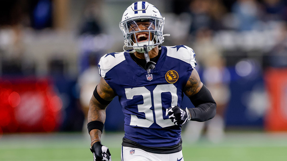 Dallas Cowboys safety Juanyeh Thomas (30) runs on to the field prior to the game against the New York Giants at AT&T Stadium.