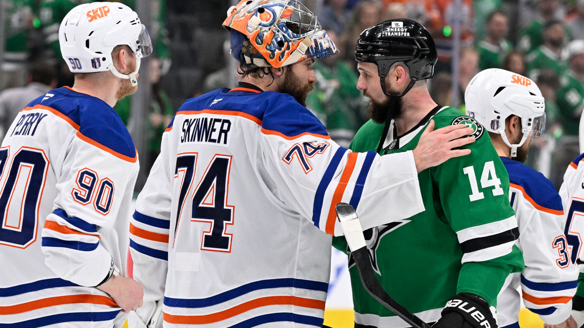 Edmonton Oilers goaltender Stuart Skinner (74) reacts with Dallas Stars left wing Jamie Benn (14) after game five of the Western Conference Final of the 2025 Stanley Cup Playoffs at American Airlines Center