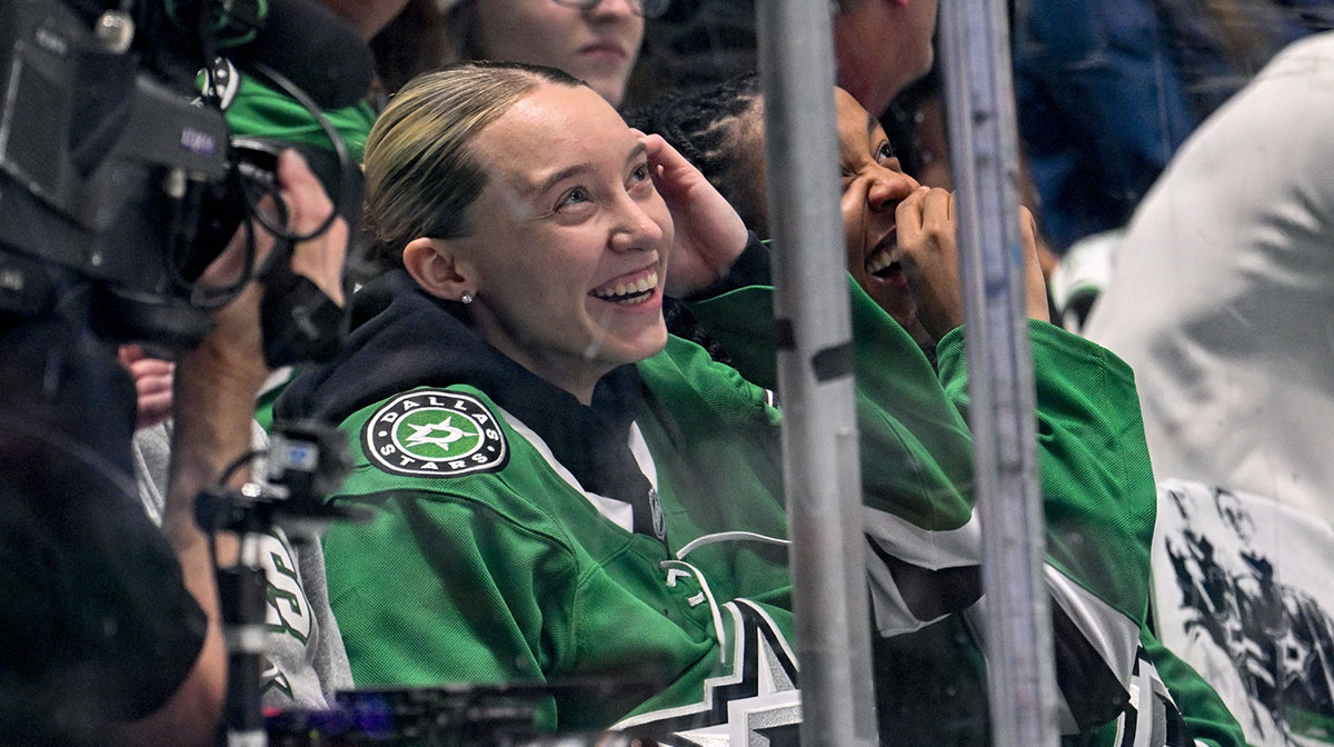 May 13, 2025; Dallas, Texas, USA; Dallas Wings guard Paige Bueckers watches the game between the Dallas Stars and the Winnipeg Jets during the first period in game four of the second round of the 2025 Stanley Cup Playoffs at American Airlines Center. Mandatory Credit: Jerome Miron-Imagn Images