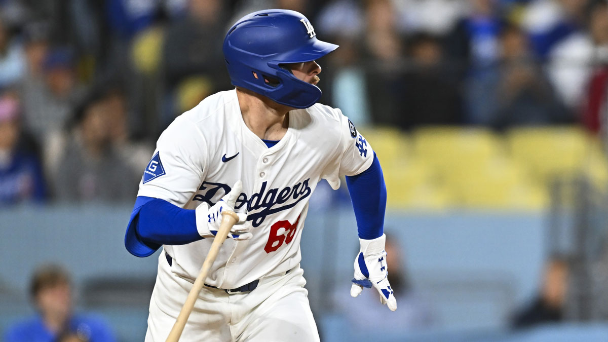 Los Angeles Dodgers catcher Dalton Rushing (68) his an RBI single against the Los Angeles Angels during the seventh inning at Dodger Stadium.