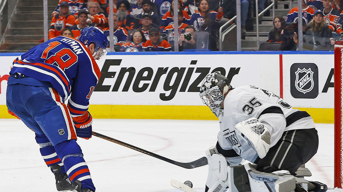 Los Angeles Kings goaltender Darcy Kuemper (35) makes a save on Edmonton Oilers forward Zach Hyman (18) during the third period in game six of the first round of the 2025 Stanley Cup Playoffs at Rogers Place.