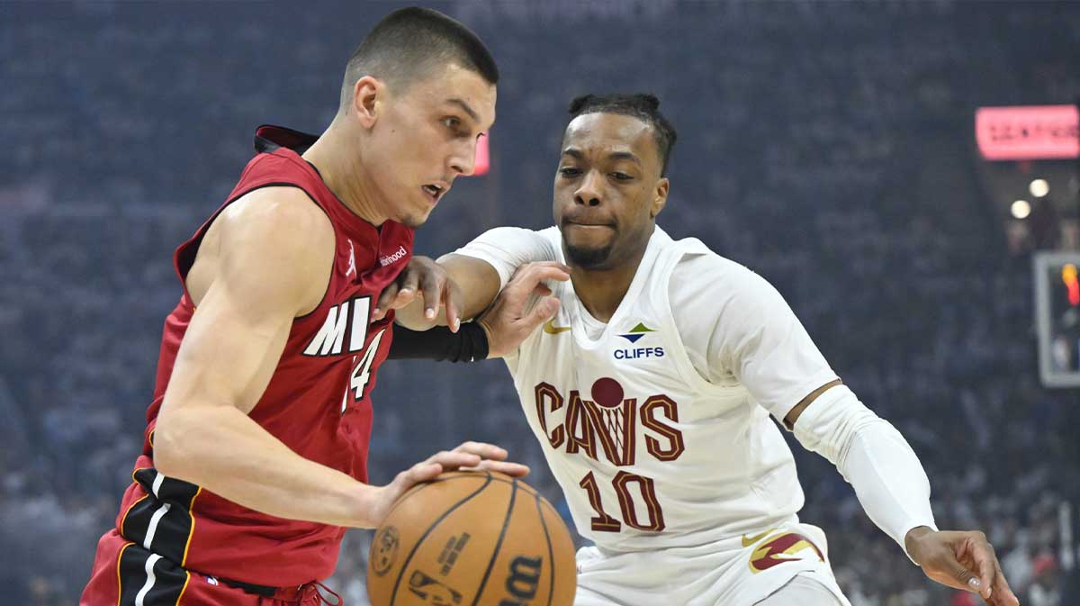 Miami Heat guard Tyler Herro (14) drives against Cleveland Cavaliers guard Darius Garland (10) in the first quarter at Rocket Arena.
