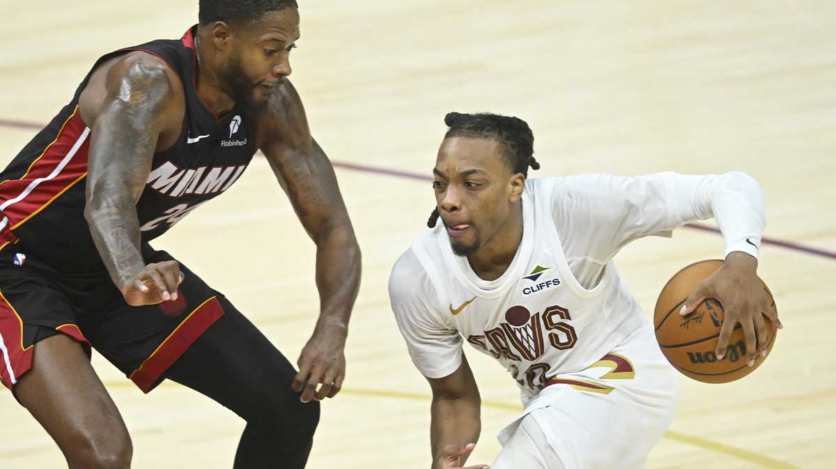 Miami Heat Haywood Highsmith's striker (24) defends Cleveland goalkeeper Darius Garland (10) in the fourth quarter of the second round of the NBA 2025 qualifiers in Rocket Arena. The Cavs won.