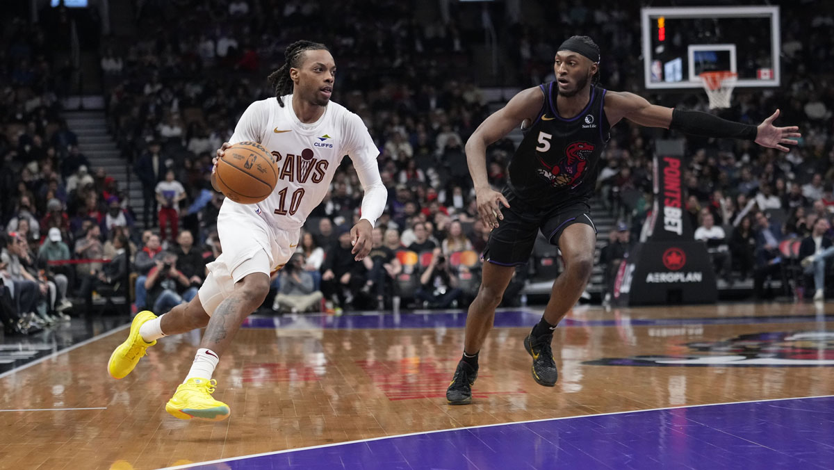Cleveland Cavaliers guard Darius Garland (10) drives to the net against Toronto Raptors guard Immanuel Quickley (5) during the second half at Scotiabank Arena.