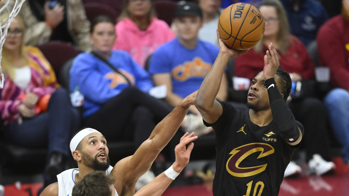 Cleveland Cavaliers guard Darius Garland (10) shoots beside Orlando Magic guard Jalen Suggs (4) and forward Franz Wagner (22) in the fourth quarter at Rocket Mortgage FieldHouse