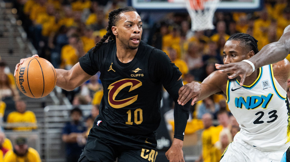 Cleveland Cavaliers guard Darius Garland (10) dribbles the ball while Indiana Pacers forward Aaron Nesmith (23) defends during game three of the second round for the 2025 NBA Playoffs at Gainbridge Fieldhouse.