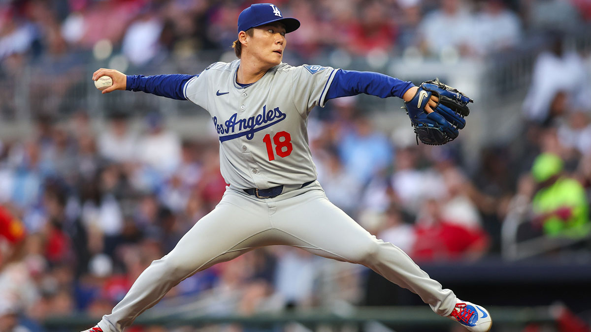 Los Angeles Dodgers starting pitcher Yoshinobu Yamamoto (18) throws against the Atlanta Braves in the second inning at Truist Park.