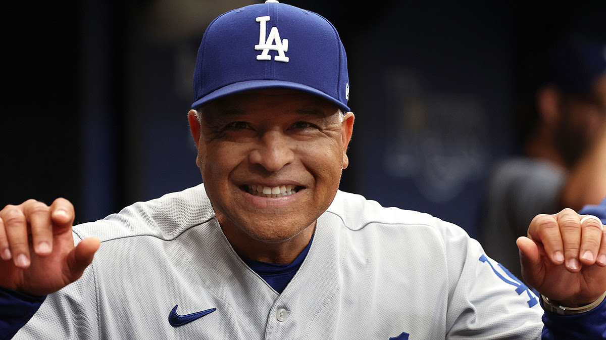 Los Angeles Dodgers manager Dave Roberts (30) smiles against the Tampa Bay Rays during the first inning.