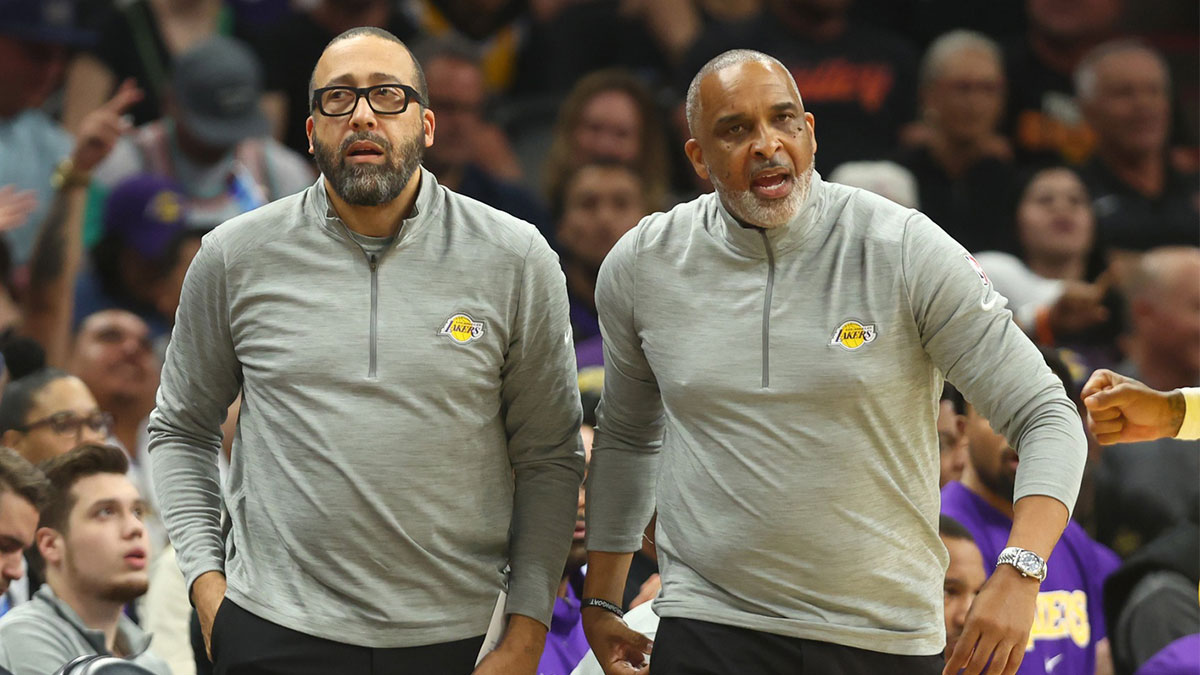 Los Angeles Lakers assistant coach David Fizdale (left) and Phil Handy against the Phoenix Suns at Footprint Center.