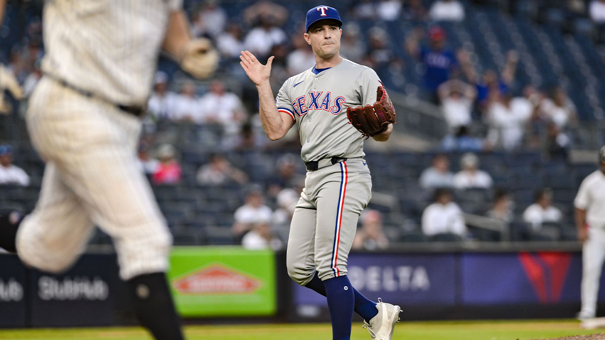 Texas Rangers pitcher David Robertson (37) reacts after getting the games final out against the New York Yankees at Yankee Stadium.