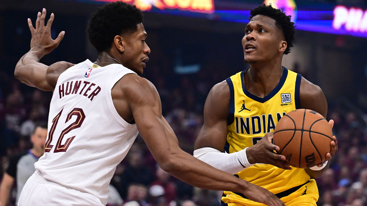 Indiana Pacers guard Bennedict Mathurin (00) drives to the basket against Cleveland Cavaliers forward De'Andre Hunter (12) during the first half in game one of the second round for the 2025 NBA Playoffs at Rocket Arena. The Cavs lost Game 1 to the Pacers.