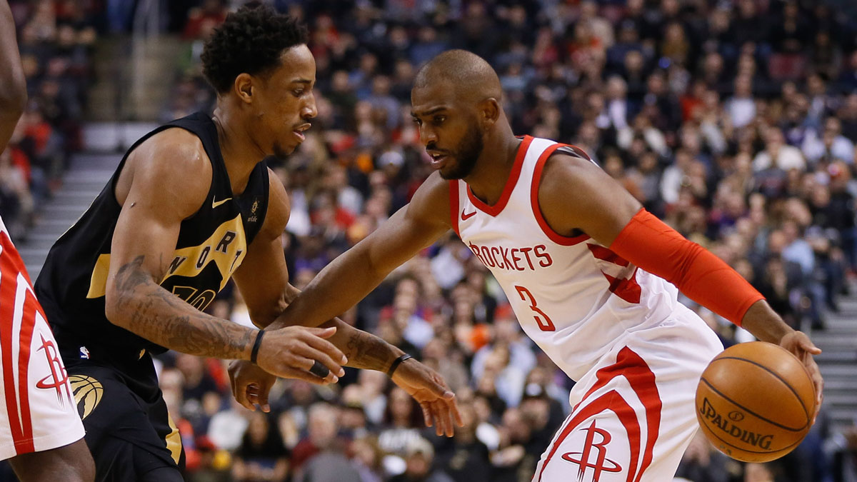 Houston Rockets guard Chris Paul (3) controls the ball against Toronto Raptors guard DeMar DeRozan (10) at the Air Canada Centre. Toronto defeated Houston 108-105.