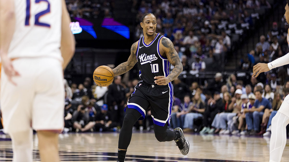 Sacramento Kings forward DeMar DeRozan (10) dribbles against the Phoenix Suns during the first quarter at Golden 1 Center.