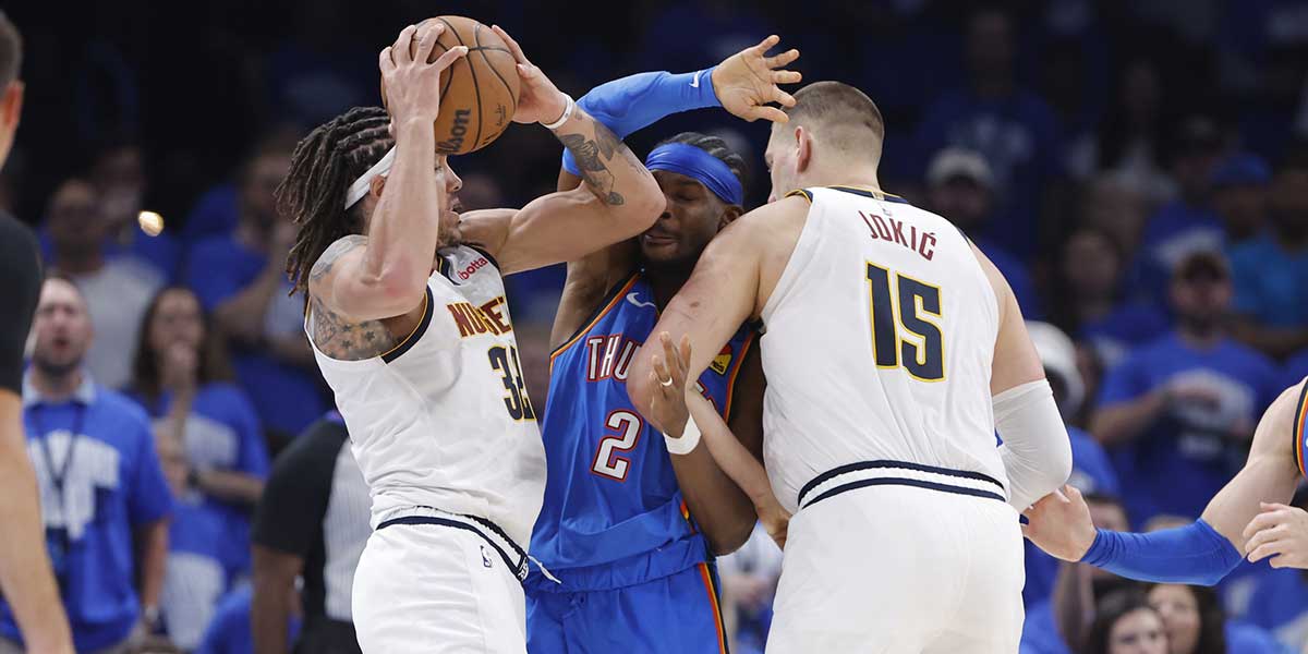 Denver Nuggets forward Aaron Gordon (32) hits Oklahoma City Thunder guard Shai Gilgeous-Alexander (2) in the face in the second half of game seven of the second round for the 2025 NBA Playoffs at Paycom Center.