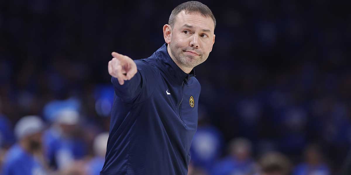 Denver Nuggets head coach David Adelman points down the court during a play against the Oklahoma City Thunder in the second quarter during game seven of the second round for the 2025 NBA Playoffs at Paycom Center.