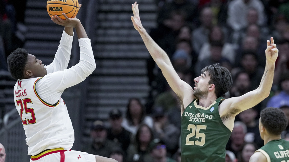 Maryland Terrapins center Derik Queen (25) drives to the basket against Colorado State Rams guard Ethan Morton (25) in the first half at Climate Pledge Arena.
