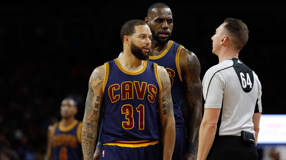 Cleveland Cavaliers guard Deron Williams (31) and forward LeBron James (23) talk to referee Justin Van Duyne (64) during the third quarter against the Detroit Pistons at The Palace of Auburn Hills. Pistons won 106-101.