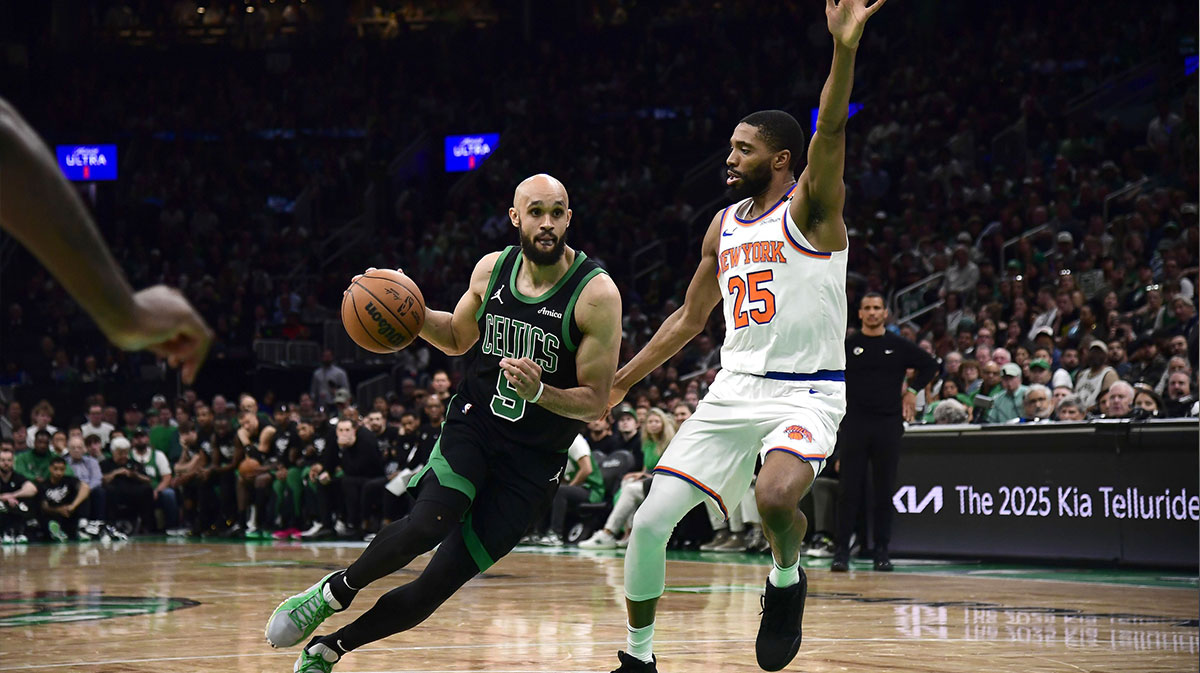 New York Knicks forward Mikal Bridges (25) defends Boston Celtics guard Derrick White (9) in the second half during game five of the second round for the 2025 NBA Playoffs at TD Garden.