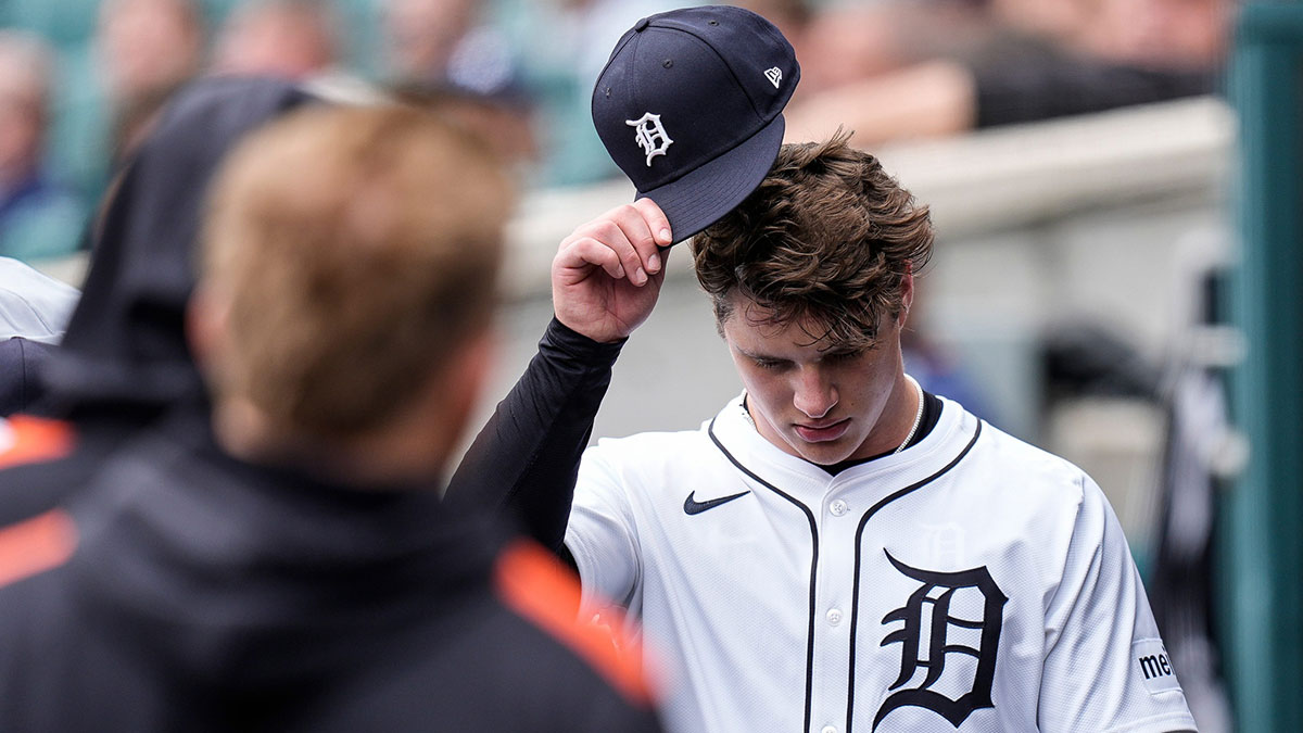 Detroit Tigers pitcher Jackson Jobe (21) walks into the dugout for a pitching change during the fifth inning at Comerica Park in Detroit on Wednesday, May 28, 2025.