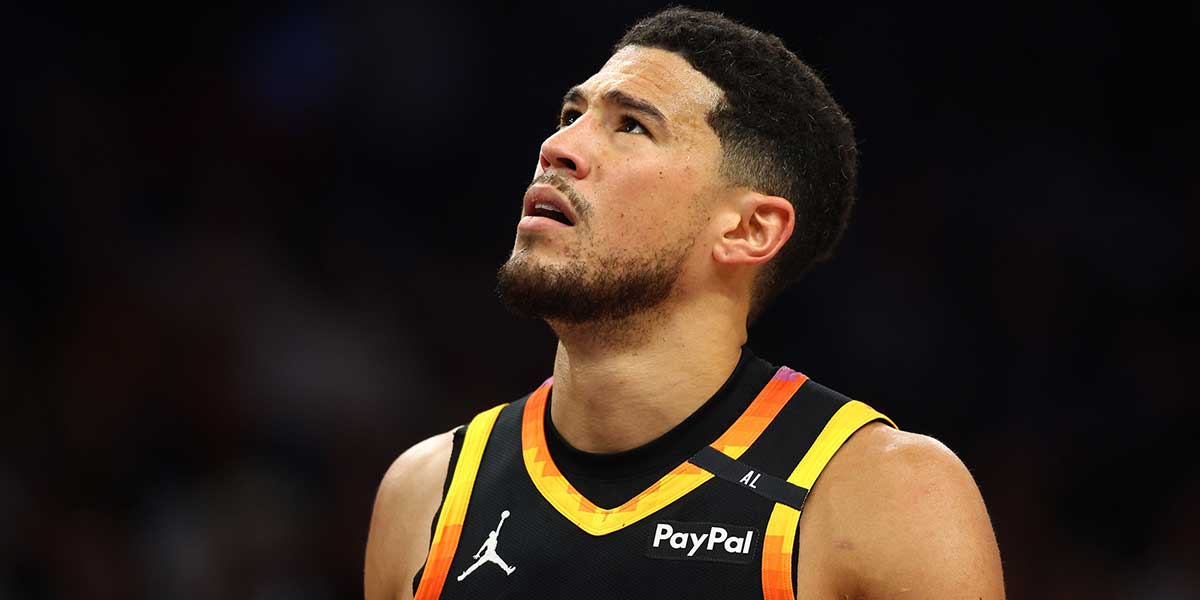Phoenix Suns guard Devin Booker (1) reacts after a play against the Oklahoma City Thunder during the first half at Footprint Center.