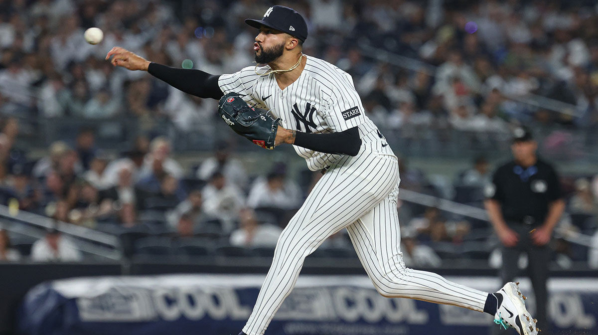 New York Yankees relief pitcher Devin Williams (38) delivers a pitch during the eighth inning against the Tampa Bay Rays at Yankee Stadium