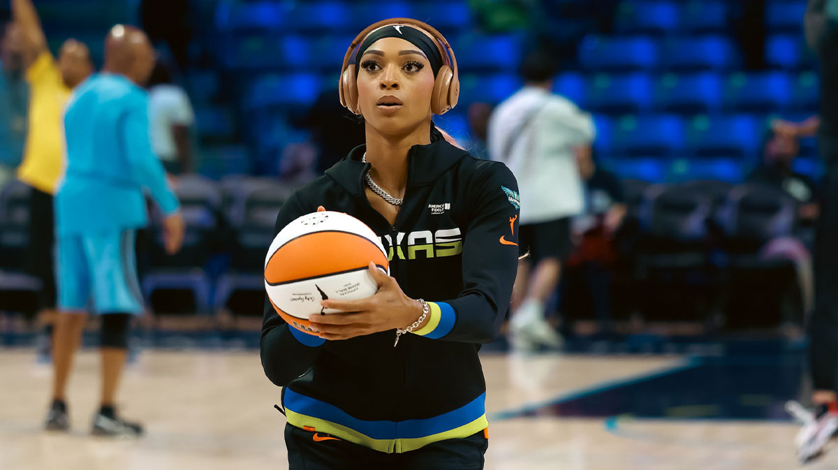 Dallas Wings guard DiJonai Carrington (24) warms up before the game against the Chicago Sky at College Park Center.