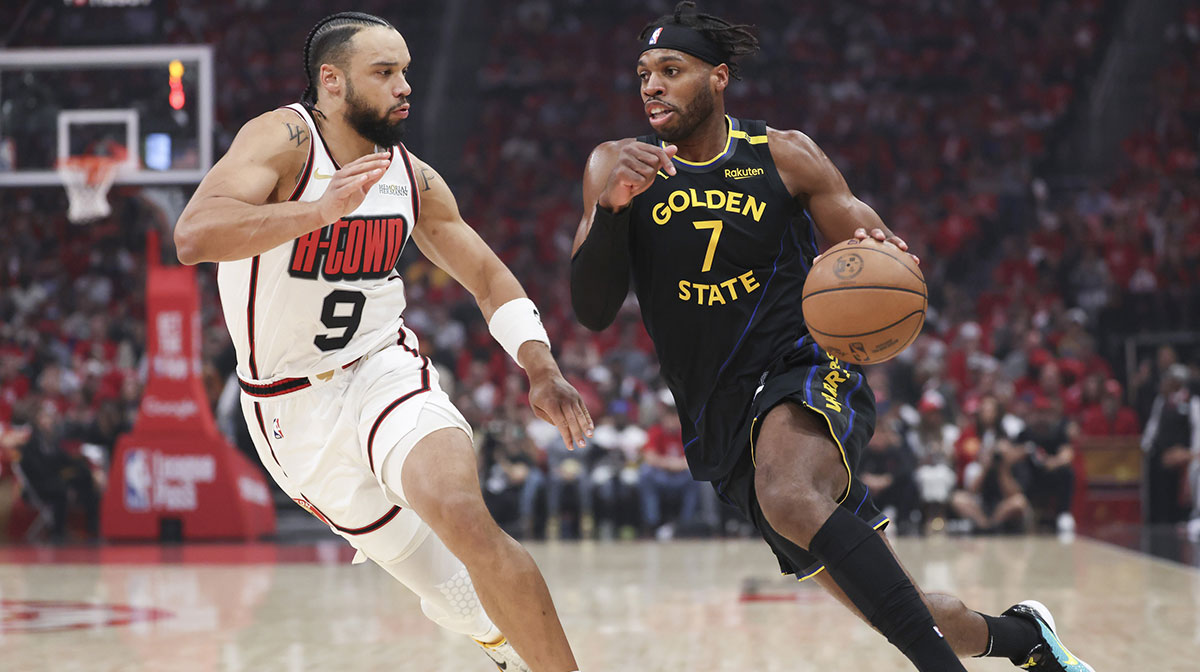 Golden State Warriors guard Buddy Hield (7) dribbles the ball as Houston Rockets forward Dillon Brooks (9) defends during the first quarter of game seven of the first round for the 2025 NBA Playoffs at Toyota Center.