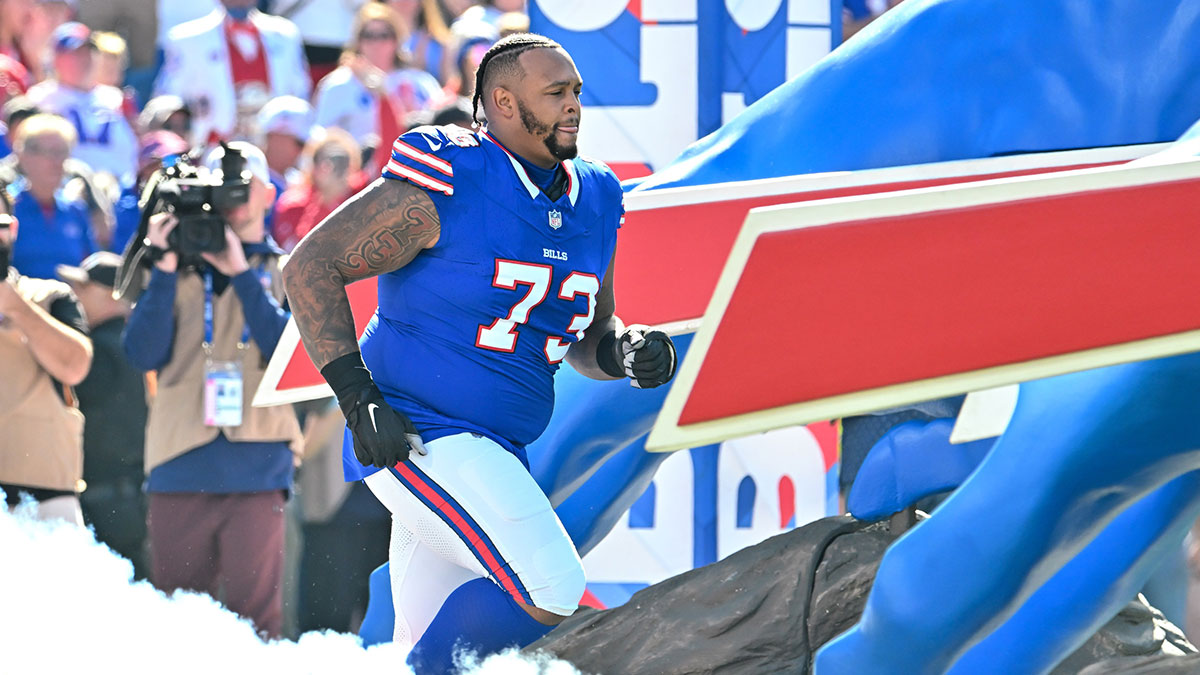 Buffalo Bills offensive tackle Dion Dawkins (73) enters the field before a game against the Tennessee Titans.
