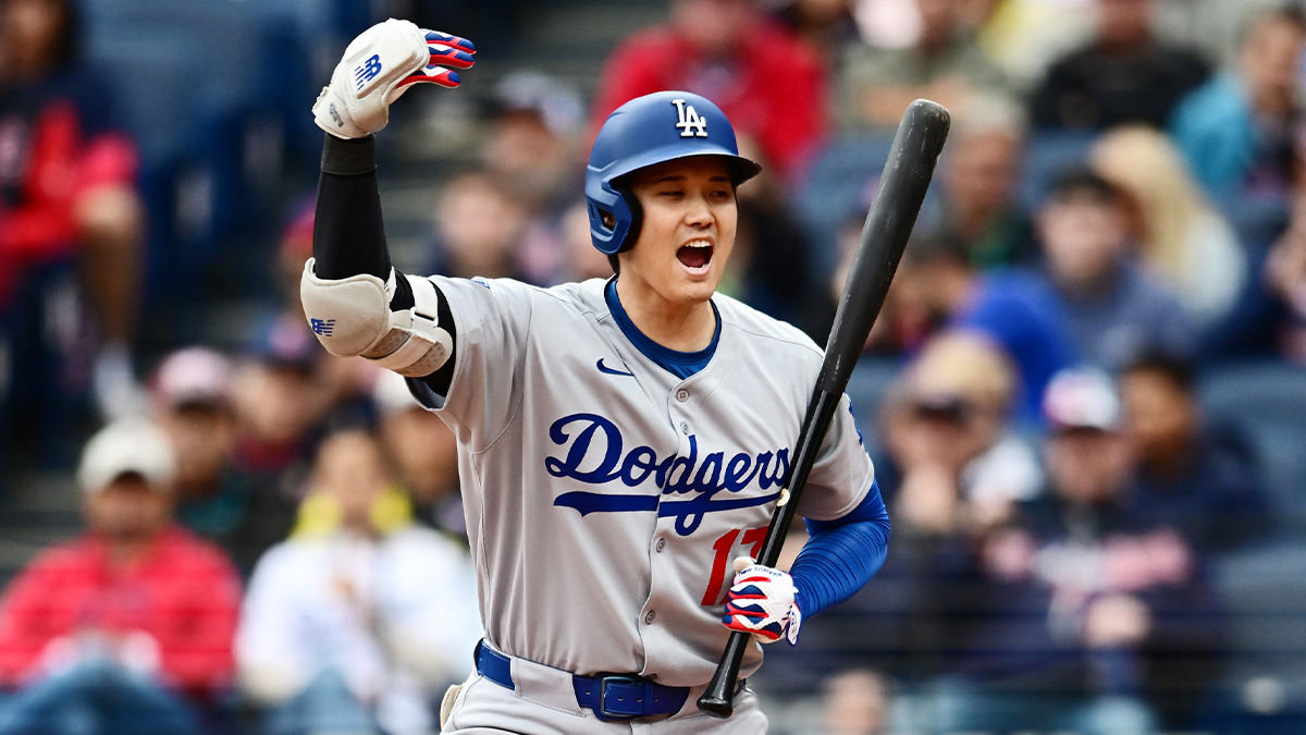 Los Angeles Dodgers designated hitter Shohei Ohtani (17) motions for Los Angeles Dodgers first baseman Kike Hernandez (not pictured) to come home on a wild pitch during the seventh inning against the Cleveland Guardians at Progressive Field.