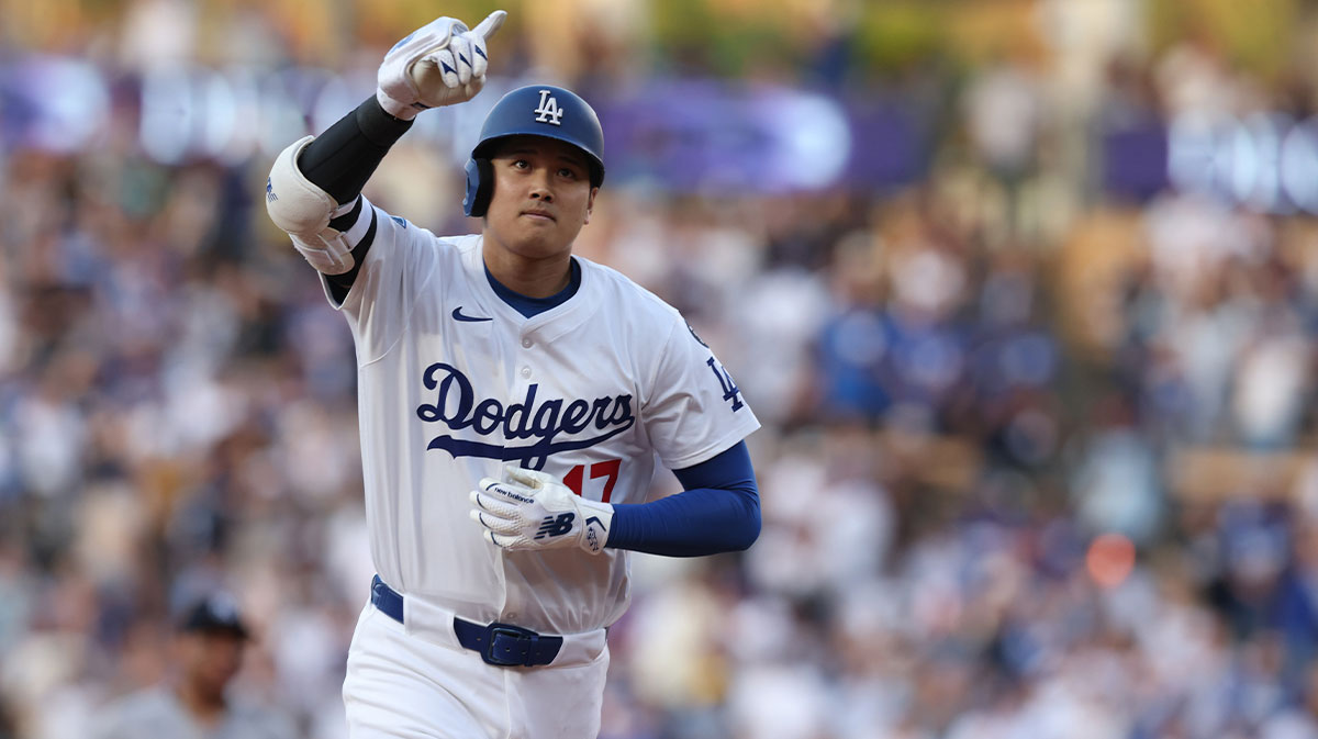 Los Angeles Dodgers two-way player Shohei Ohtani (17) rounds the bases after hitting a home run during the first inning against the New York Yankees at Dodger Stadium.