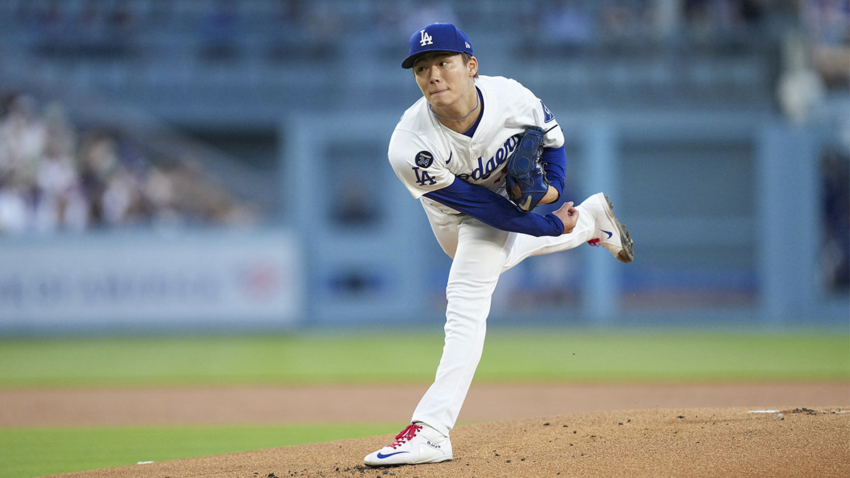 Los Angeles Dodgers pitcher Yoshinobu Yamamoto (18) throws a pitch in the first inning against the Arizona Diamondbacks at Dodger Stadium.