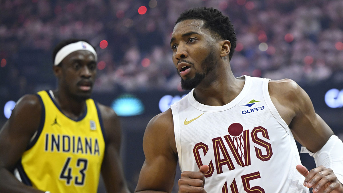 Cleveland Cavaliers guard Donovan Mitchell (45) runs on the court beside Indiana Pacers forward Pascal Siakam (43) in the first quarter during game two of the second round of the 2025 NBA Playoffs at Rocket Arena.