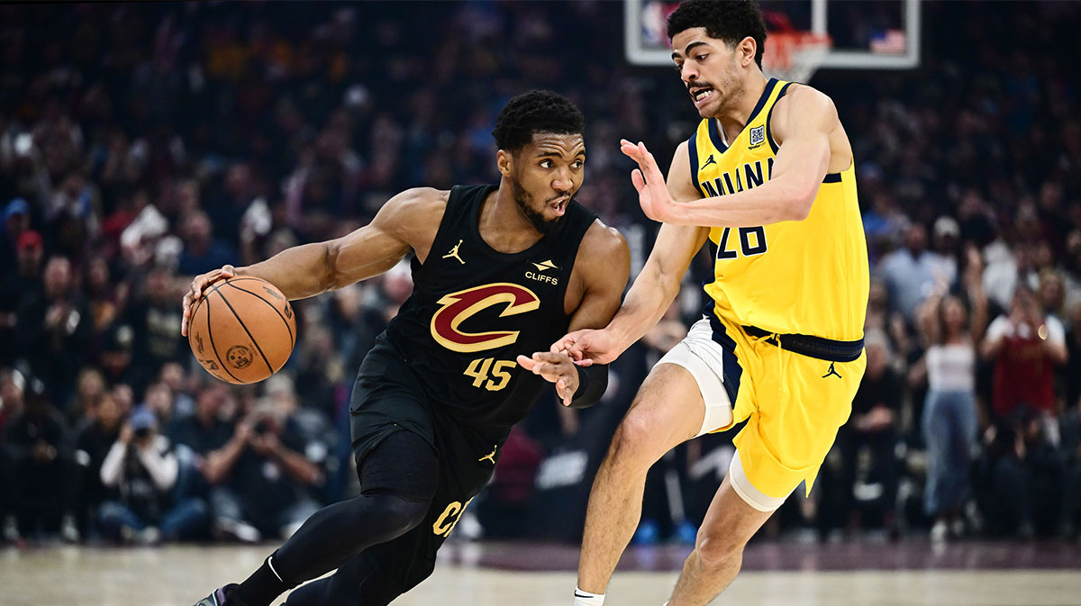Cleveland Cavaliers guard Donovan Mitchell (45) drives to the basket against Indiana Pacers guard Ben Sheppard (26) during the first half of game five of the second round for the 2025 NBA Playoffs at Rocket Arena.