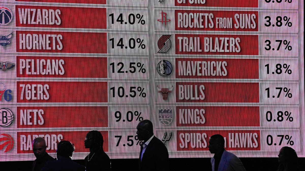 Representitives of the NBA teams walk onto the stage during the 2025 NBA Draft Lottery at McCormick Place.