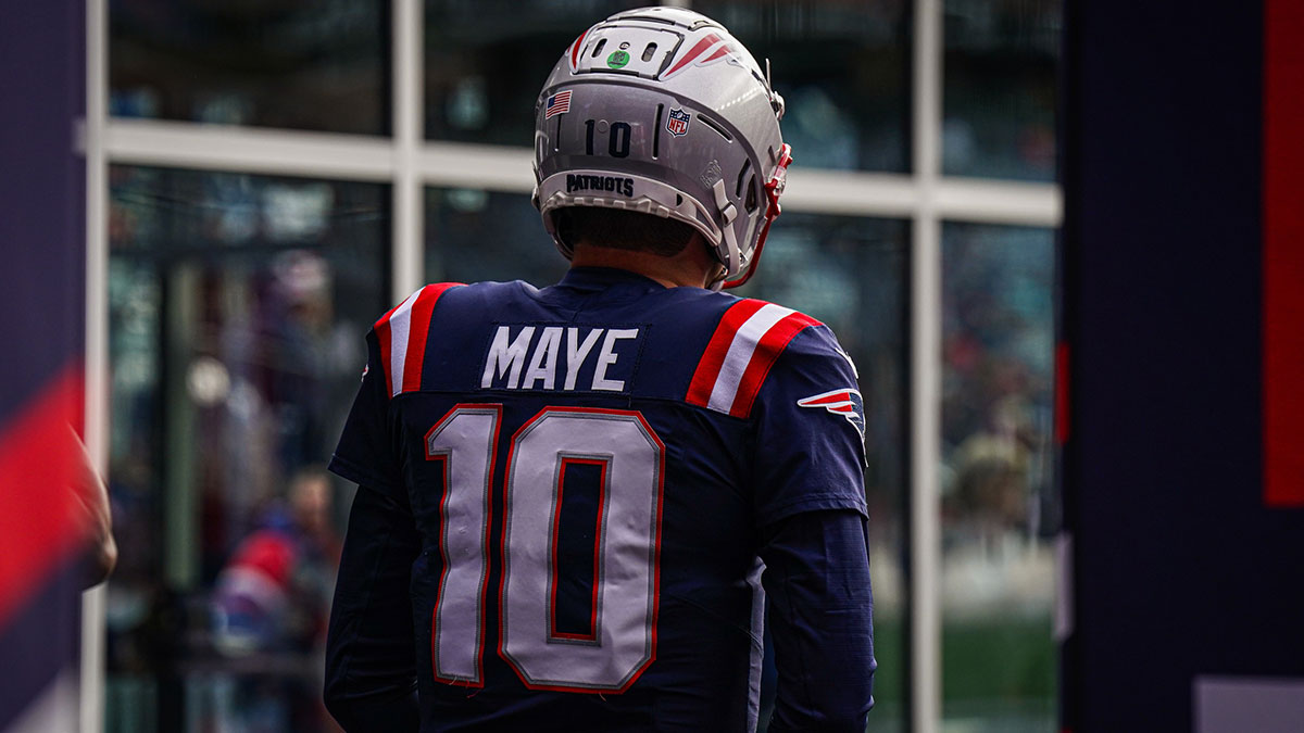 New England Patriots quarterback Drake Maye (10) walks to the field to warm up before the start of the game against the Buffalo Bills.