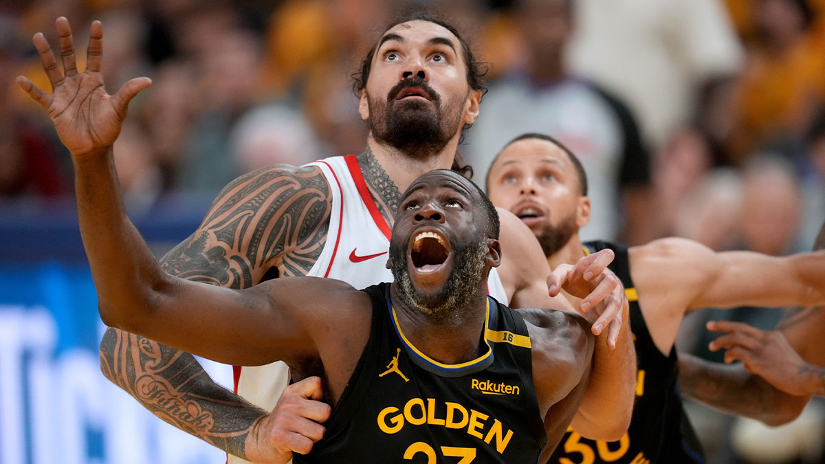 Golden State Warriors forward Draymond Green (23) battles for position with Houston Rockets center Steven Adams (12) in the fourth quarter of game six of the first round for the 2025 NBA Playoffs at Chase Center.