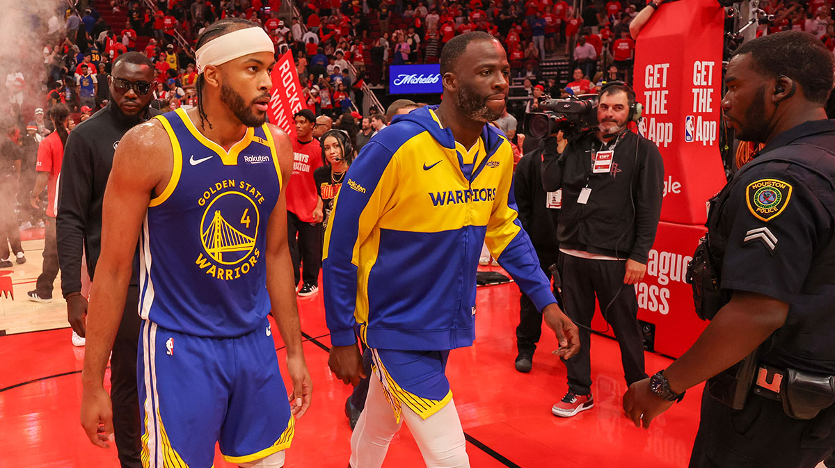 Golden State Warriors guard Moses Moody (4) and forward Draymond Green (23) walks off the court after loosing to the Houston Rockets in game five of first round for the 2025 NBA Playoffs at Toyota Center.