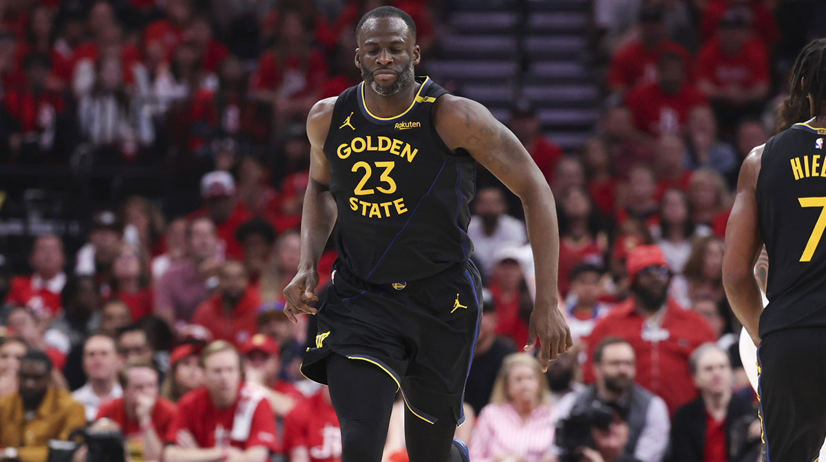 Golden State Warriors forward Draymond Green (23) reacts after scoring a basket during the third quarter of game seven of the first round for the 2025 NBA Playoffs against the Houston Rockets at Toyota Center.