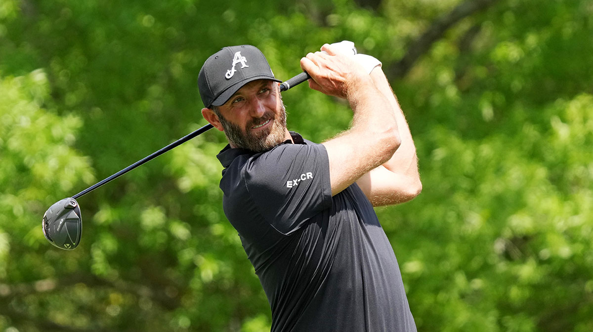 Dustin Johnson plays his shot from the fifth tee during the first round of the Masters Tournament.