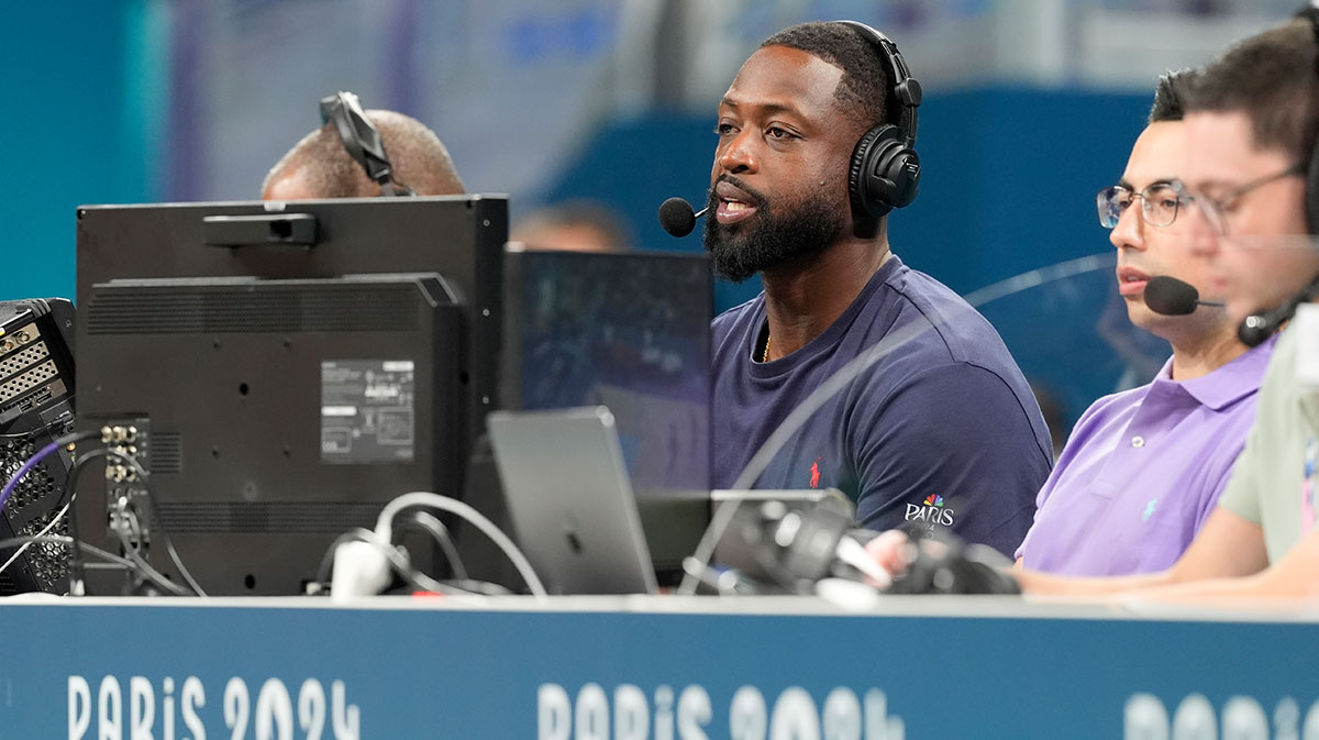 Dwyane Wade looks on from the media bench during the first half between Canada and Greece during the Paris 2024 Olympic Summer Games at Stade Pierre-Mauroy.