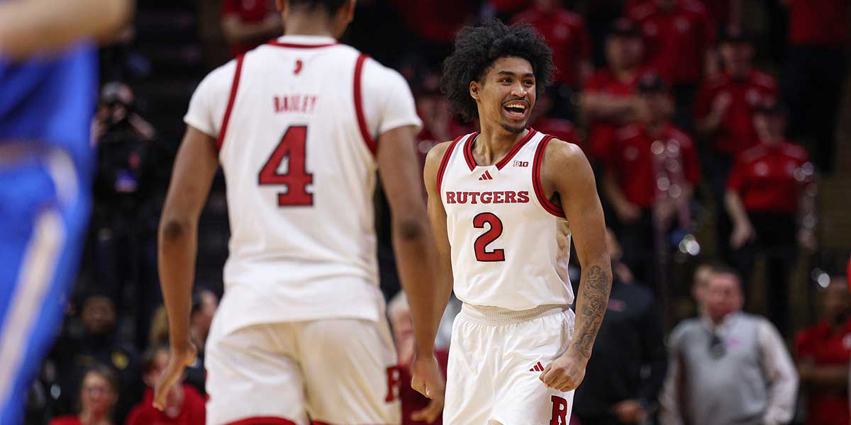 Rutgers Scarlet Knights guard Dylan Harper (2) celebrates in front of guard Ace Bailey (4) during the second half against the UCLA Bruins at Jersey Mike's Arena.
