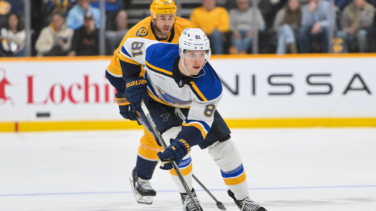 St. Louis Blues center Dylan Holloway (81) skates with the puck against the Nashville Predators during the second period at Bridgestone Arena.