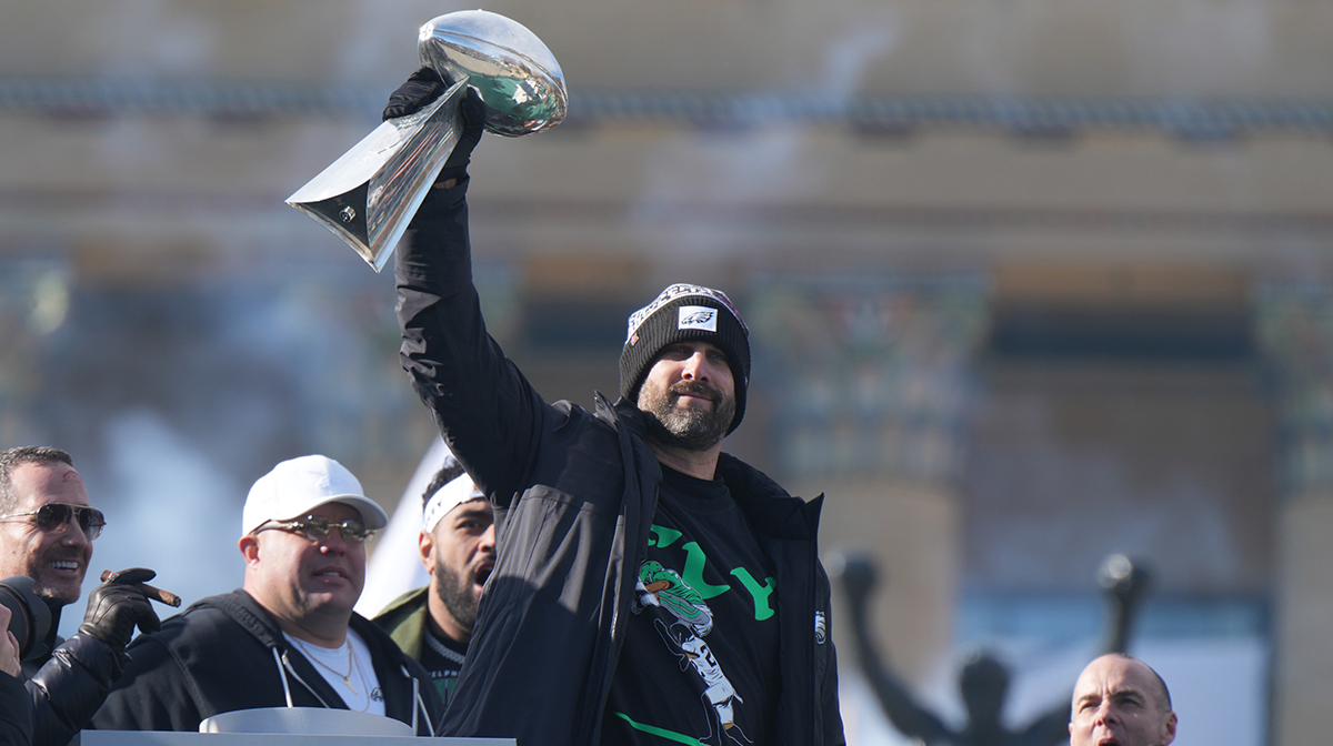 Philadelphia Eagles head coach Nick Sirianni raises the Vince Lombardi Trophy during the Super Bowl LIX championship parade and rally.