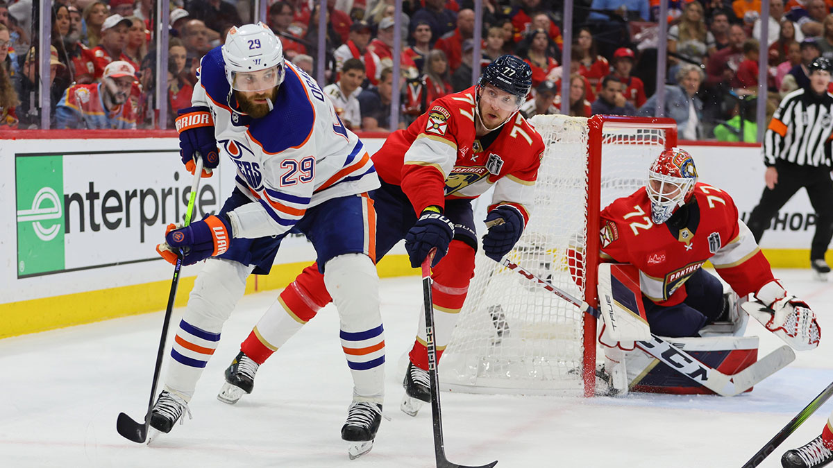 Edmonton Oilers forward Leon Draisaitl (29) controls the puck against Florida Panthers defenseman Niko Mikkola (77) during the third period in game seven of the 2024 Stanley Cup Final at Amerant Bank Arena.