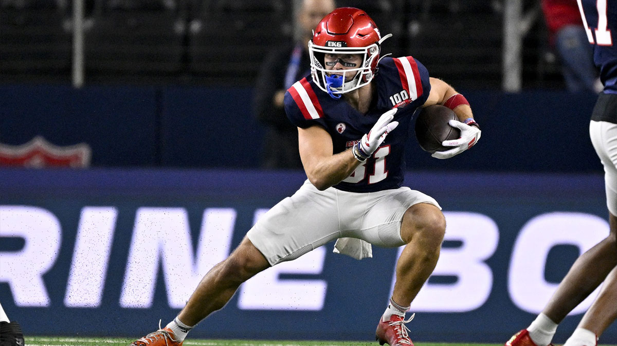 East wide receiver Efton Chism of Eastern Washington (81) runs with the ball during the first half against the West at AT&T Stadium.