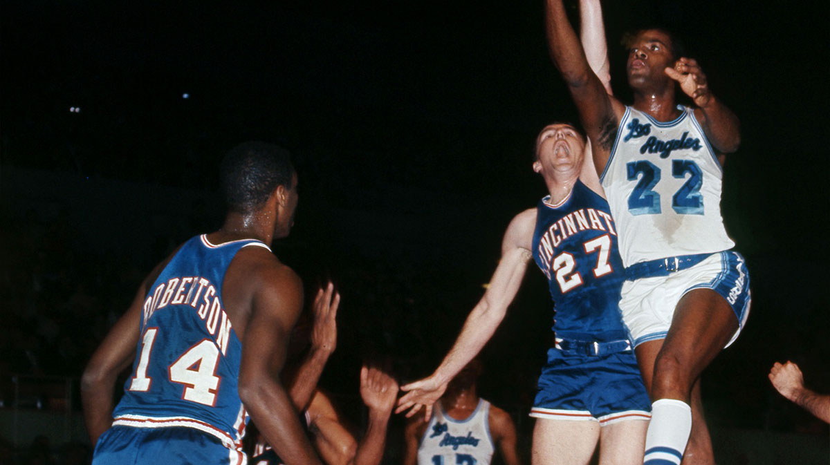 Los Angeles Lakers forward Elgin Baylor (22) shoots past Cincinnati Royals forward Jack Twyman (27) at the Los Angeles Sports Arena.
