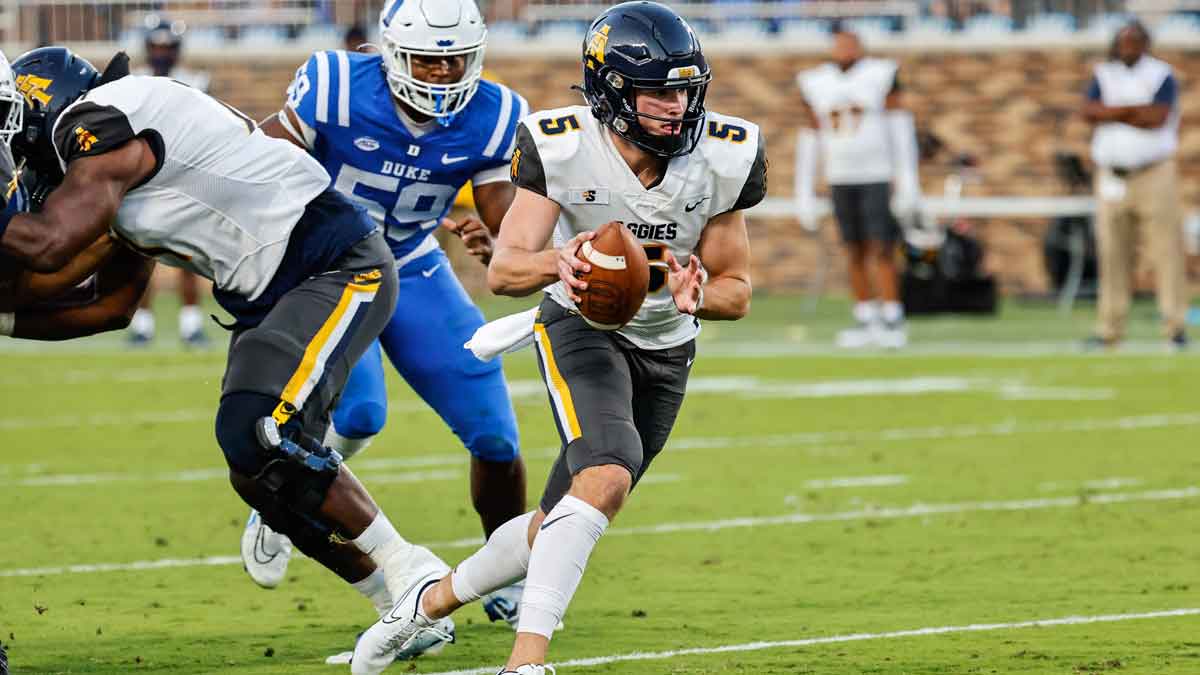 orth Carolina A&T Aggies quarterback Eli Brickhandler (5) runs with the ball during first half against Duke Blue Devils
