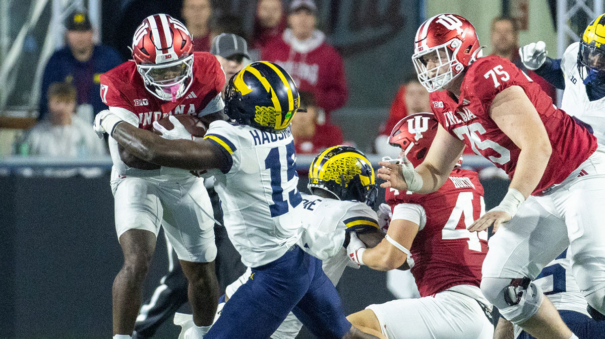 Indiana Hoosiers running back Ty Son Lawton (17) runs with the ball while Michigan Wolverines linebacker Ernest Hausmann (15) defends in the second half at Memorial Stadium.